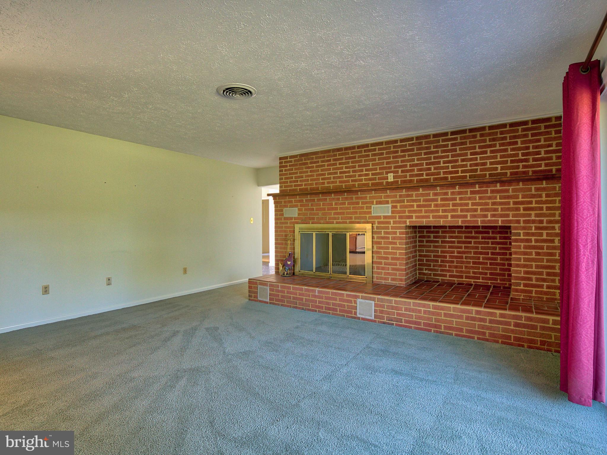164 Hanging Tree Road Winchester, VA 22603 - Photo 16 of 43 There is also large storage space for fire wood