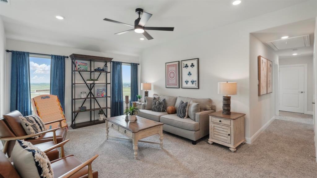 1016 Pitchfork Road Royse City, TX 75189 - Photo 31 of 35 a living room with furniture a ceiling fan and a window