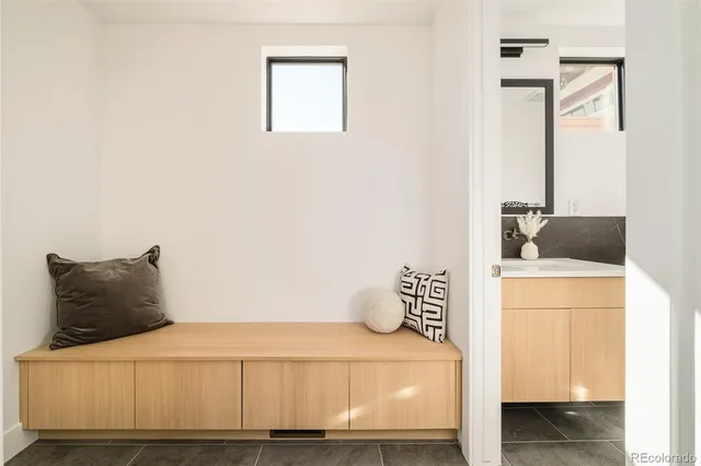 a bedroom with a bed and a table