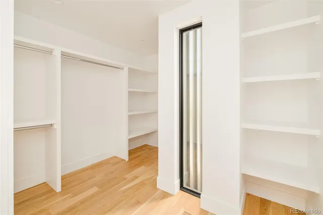 a view of a bedroom from a hallway