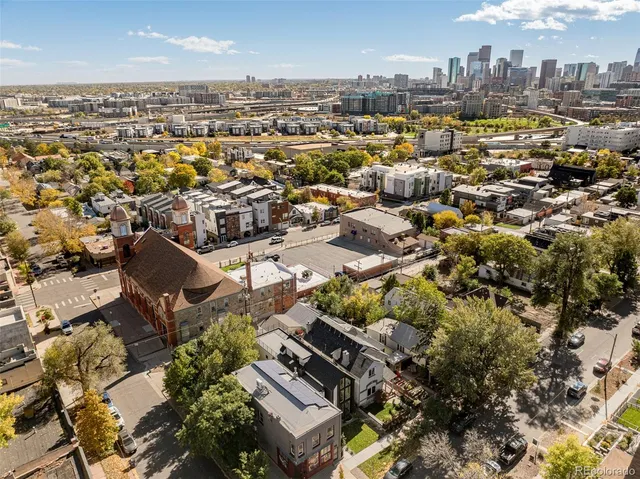 an aerial view of a city with lots of residential buildings
