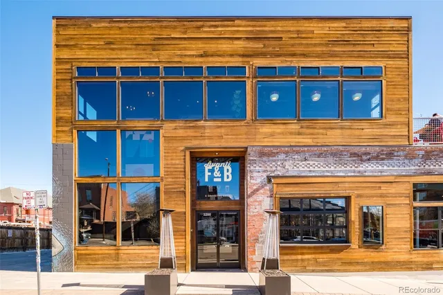 a front view of a building with a outdoor space