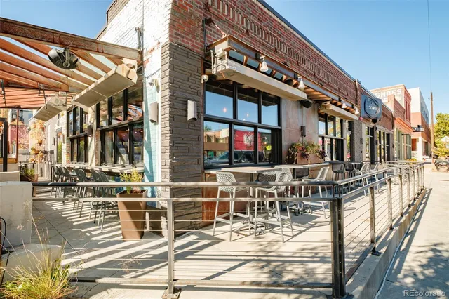 a view of a building with sitting area