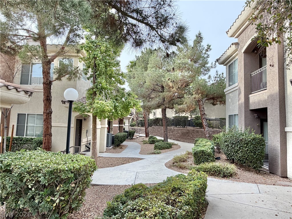 9050 West Warm Springs Road, Unit 1030 Las Vegas, NV 89148 - Photo 33 of 60 MATURE LANDSCAPING IS BEAUITFUL.