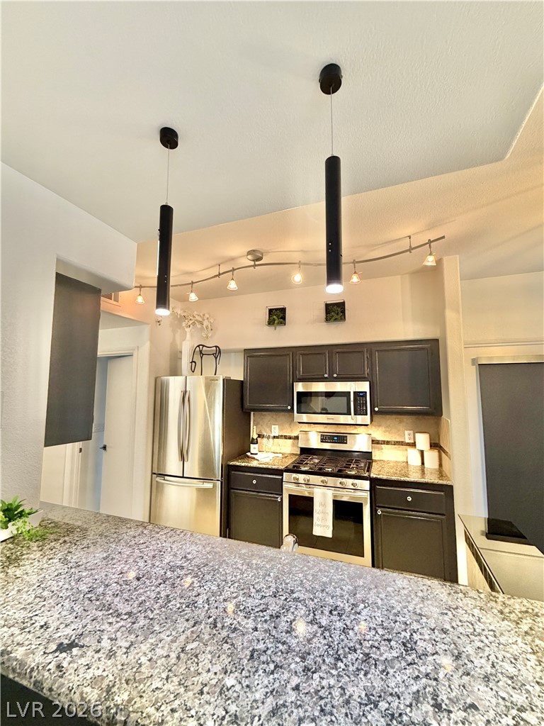 9050 West Warm Springs Road, Unit 1030 Las Vegas, NV 89148 - Photo 9 of 60 SPACIOUS UPSCALE KITCHEN.