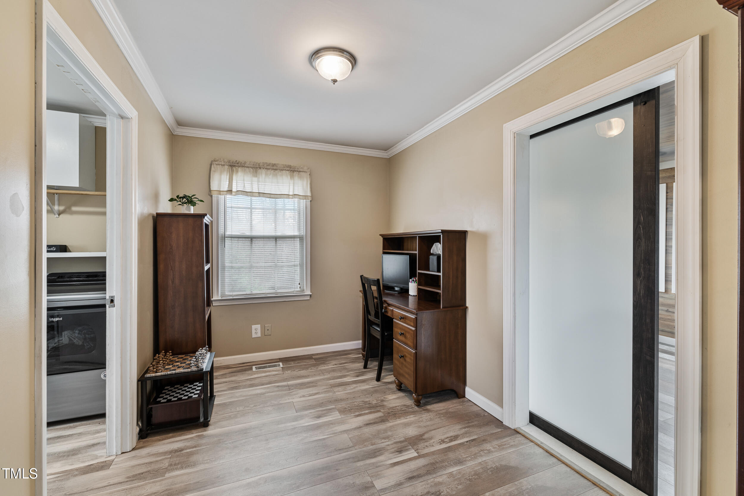 7155 Old Fairground Road Benson, NC 27504 - Photo 10 of 25 a view of livingroom with hardwood floor and hallway