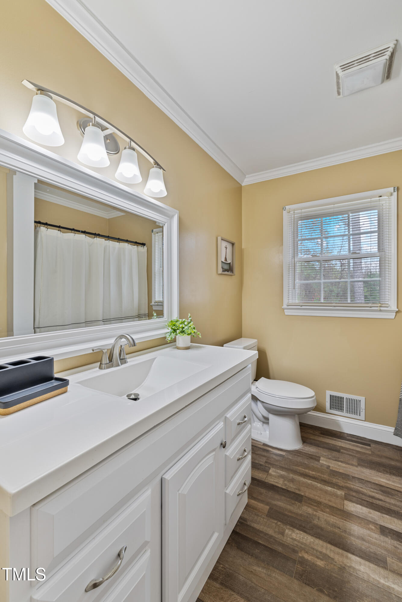 7155 Old Fairground Road Benson, NC 27504 - Photo 18 of 25 a bathroom with a sink and a mirror