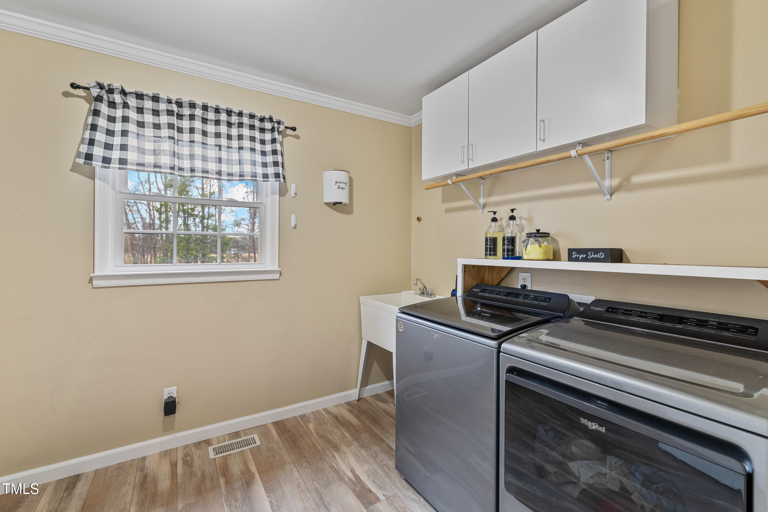 7155 Old Fairground Road Benson, NC 27504 - Photo 20 of 25 a utility room with washer and dryer