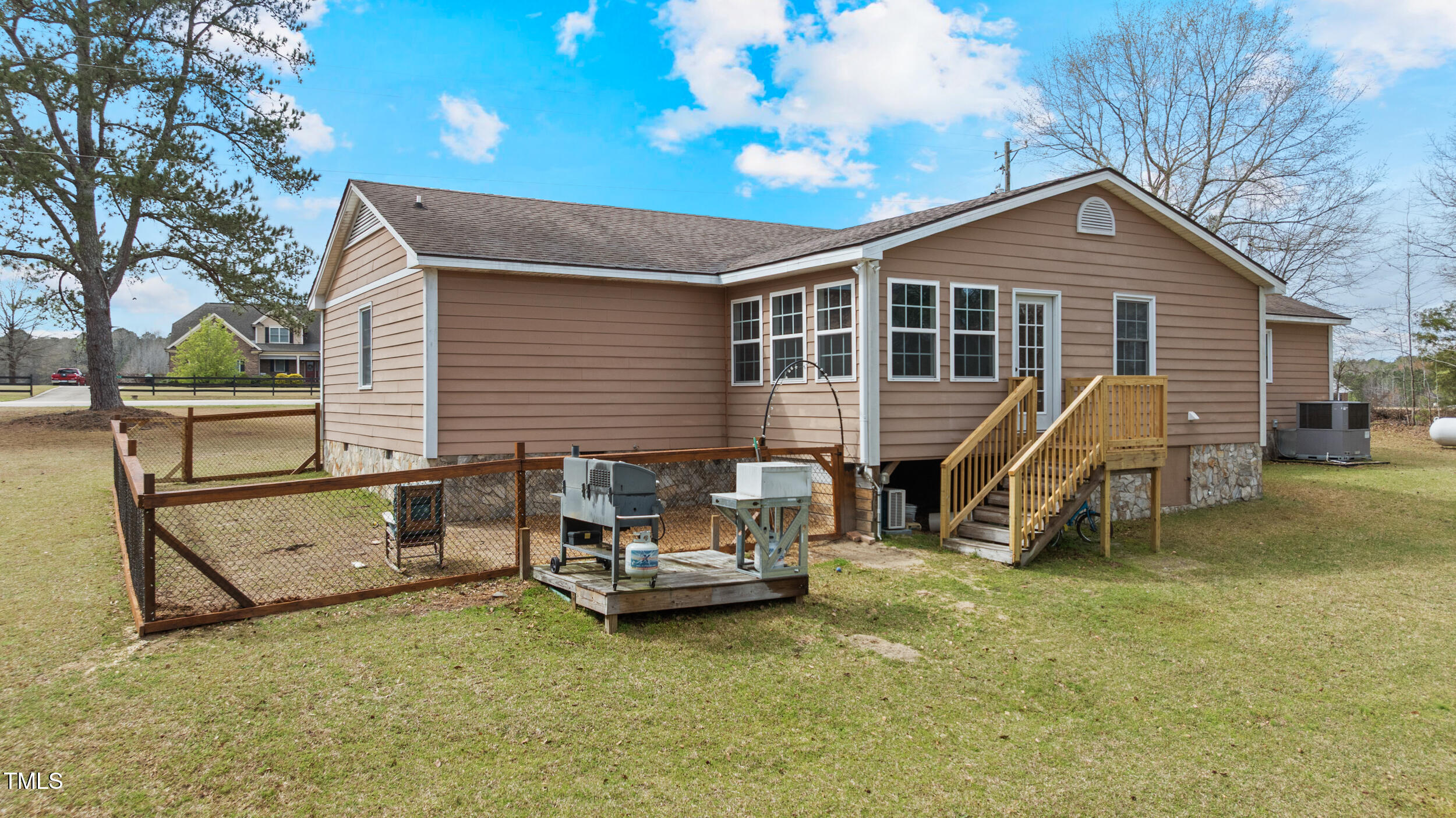 7155 Old Fairground Road Benson, NC 27504 - Photo 21 of 25 a view of a house with a patio