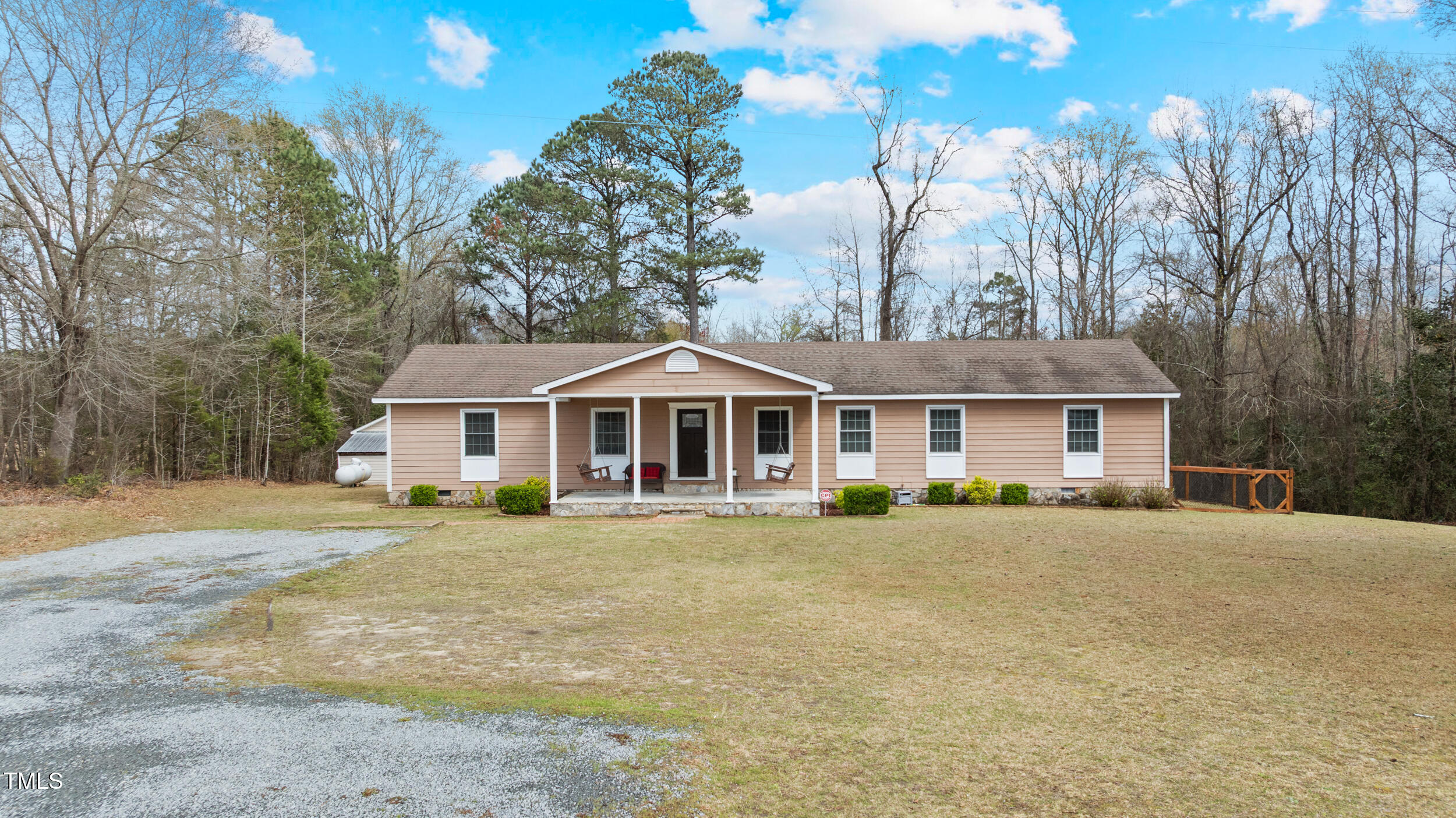 7155 Old Fairground Road Benson, NC 27504 - Photo 2 of 25 a front view of a house with a garden