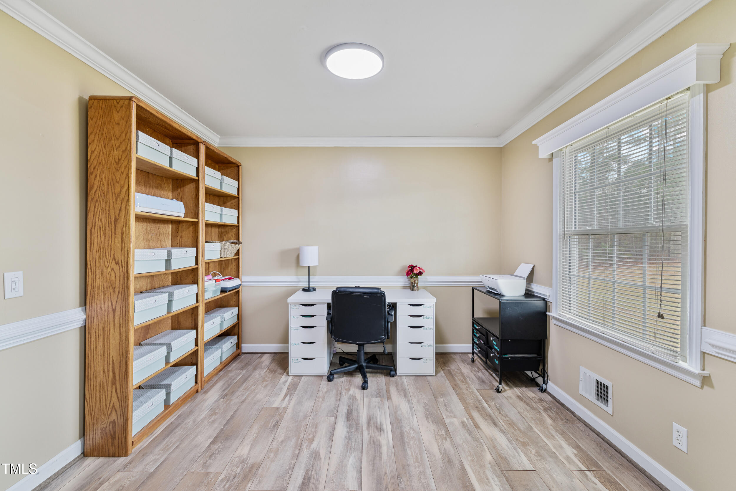 7155 Old Fairground Road Benson, NC 27504 - Photo 4 of 25 a workspace with furniture and window