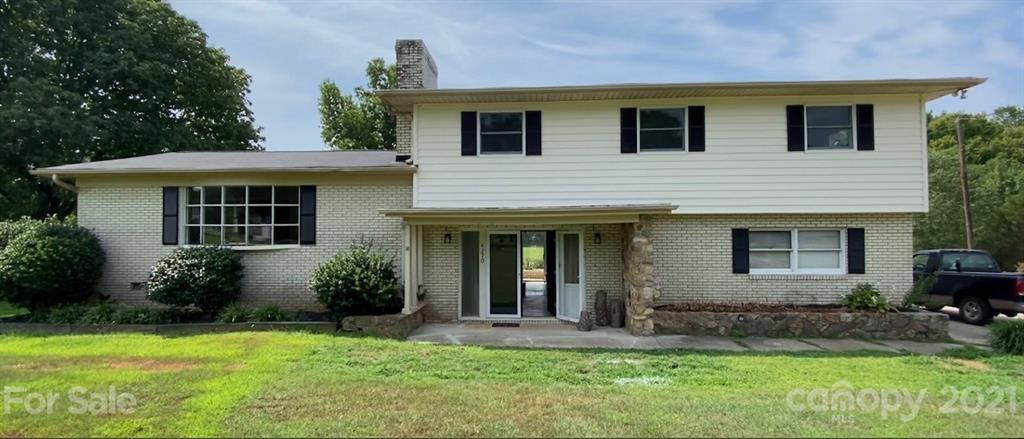 4270 Garmon Mill Road Midland, NC 28107 - Photo 1 of 37 a front view of a house with garden