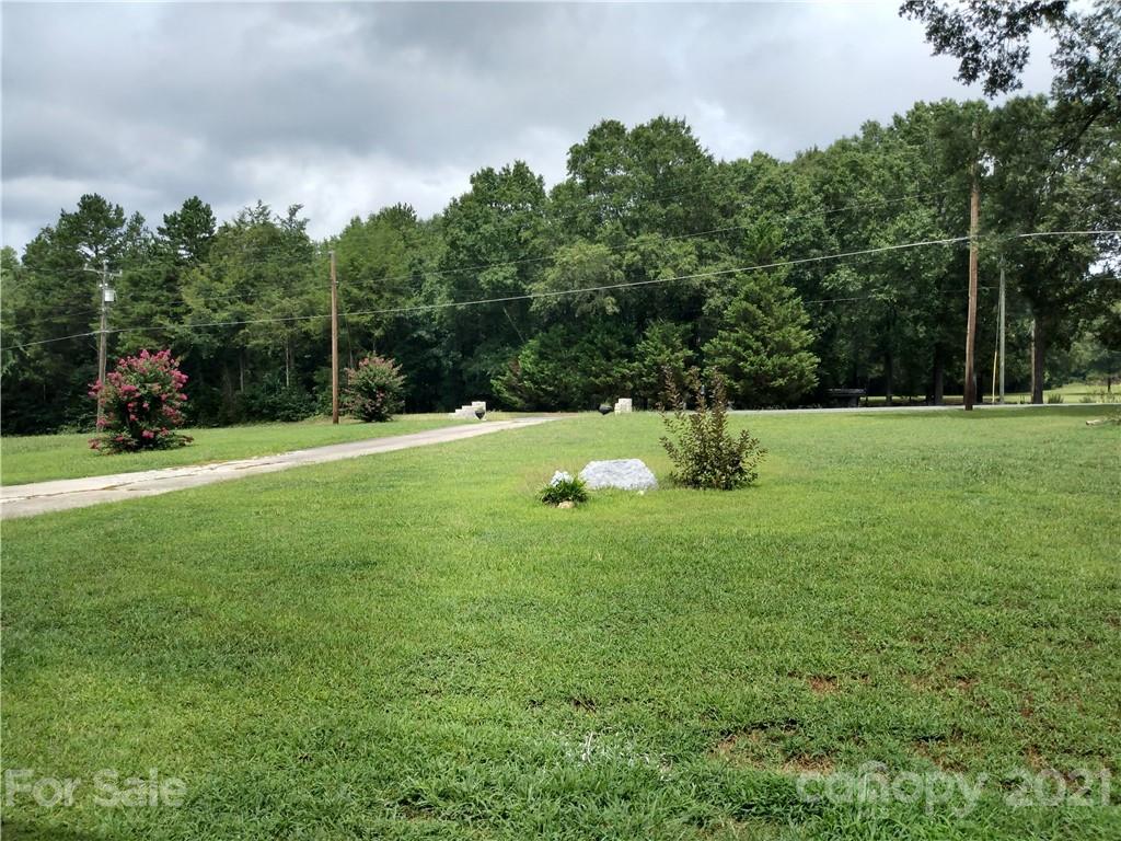 4270 Garmon Mill Road Midland, NC 28107 - Photo 15 of 37 a backyard of a house with lots of green space