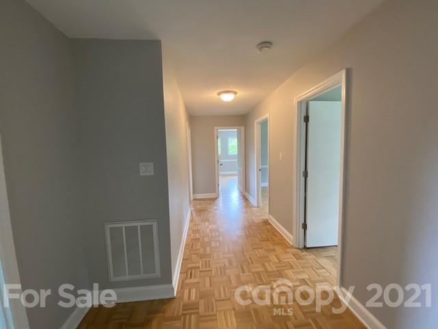 4270 Garmon Mill Road Midland, NC 28107 - Photo 26 of 37 a view of a hallway with wooden floor