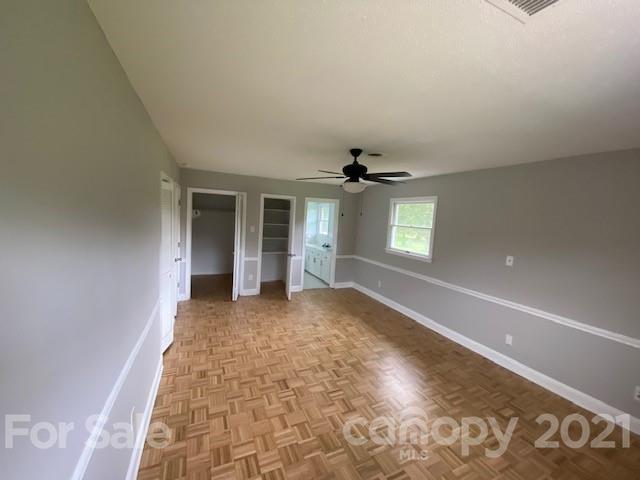 4270 Garmon Mill Road Midland, NC 28107 - Photo 31 of 37 wooden floor in an empty room with a window