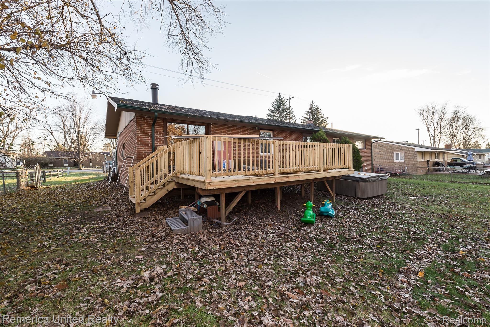 2450 North Long Lake Road Fenton, MI 48430 - Photo 30 of 44 Back Yard - new deck