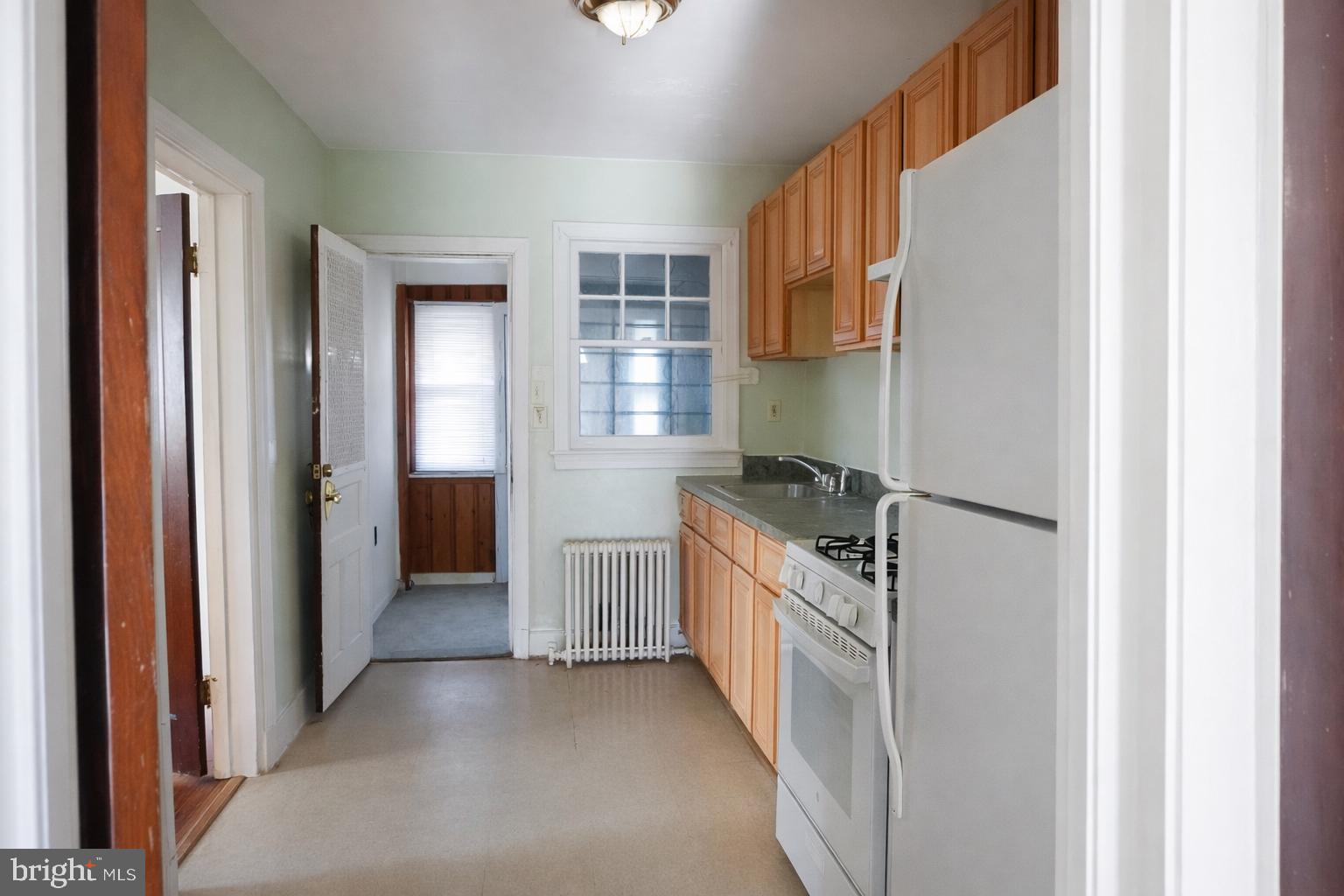 1464 Morris Road Southeast Washington, DC 20020 - Photo 9 of 23 a kitchen with stainless steel appliances granite countertop a refrigerator and a stove