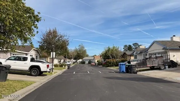 a car parked in front of a house