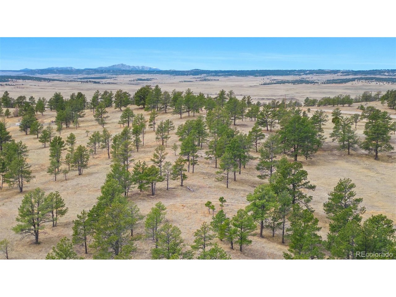 77 County Road Calhan, CO 80808 - Photo 1 of 32 a view of lake with mountain