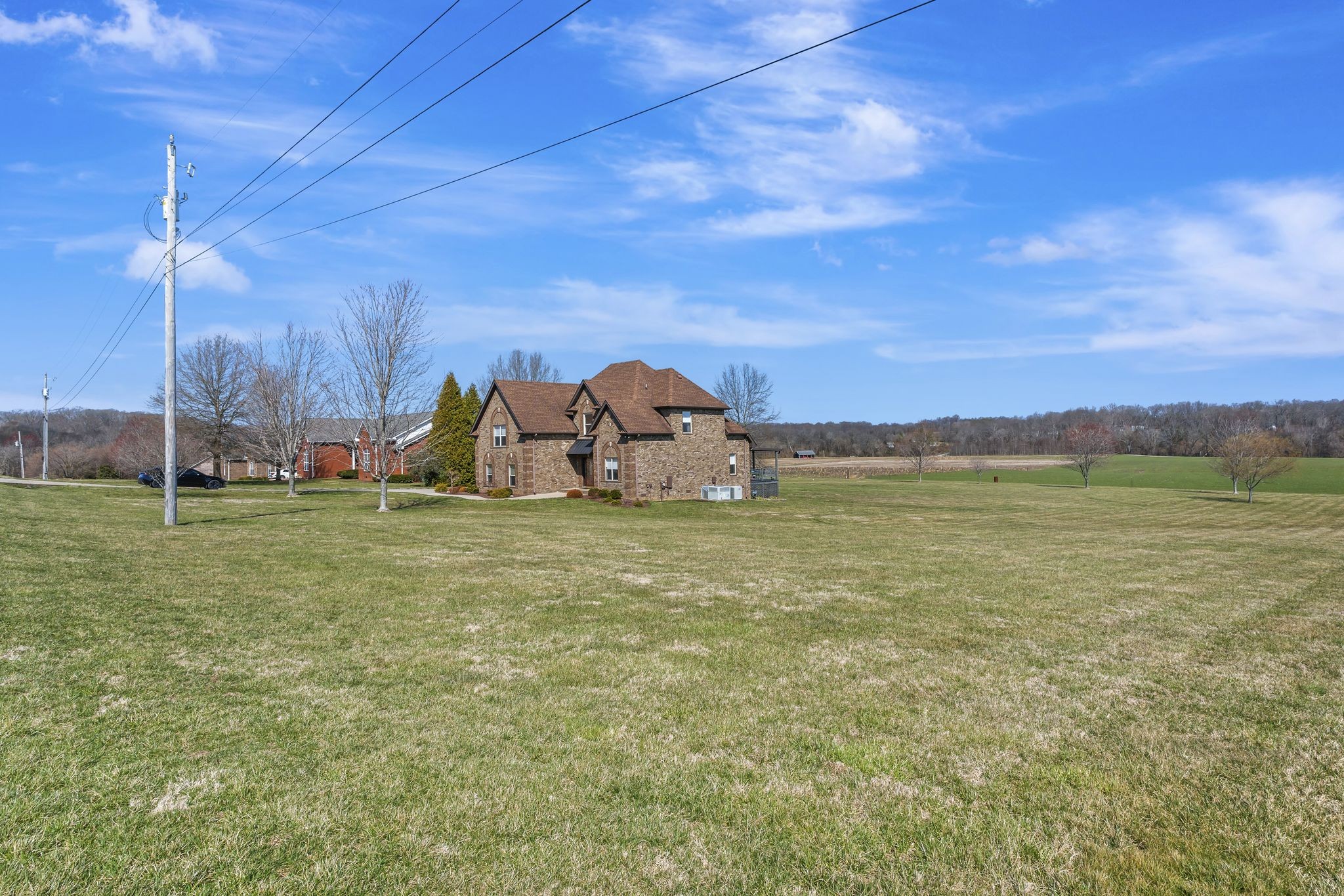 263 Aplin Branch Road Cottontown, TN 37048 - Photo 3 of 29 a view of a field with an trees