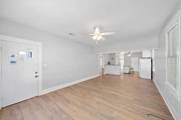 a view of an empty room with a window