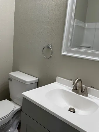 a bathroom with a sink and a toilet