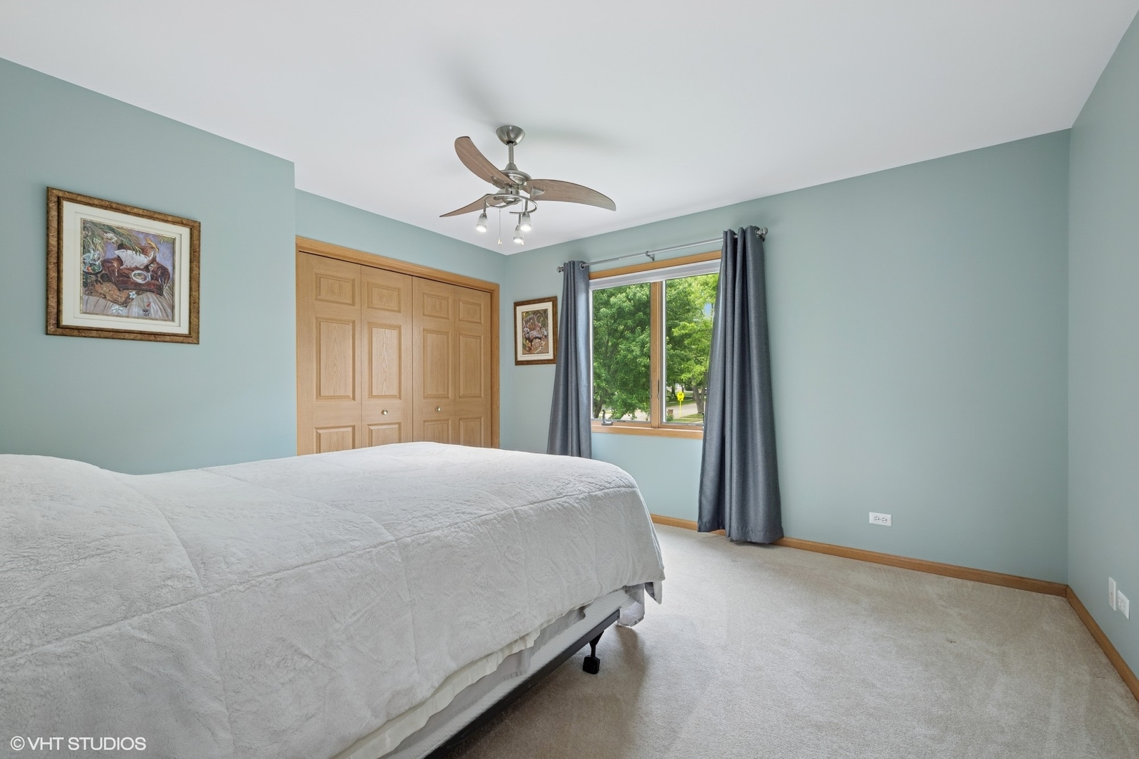 810 Tamarac Drive Algonquin, IL 60102 - Photo 18 of 36 a bedroom with a large bed and a window