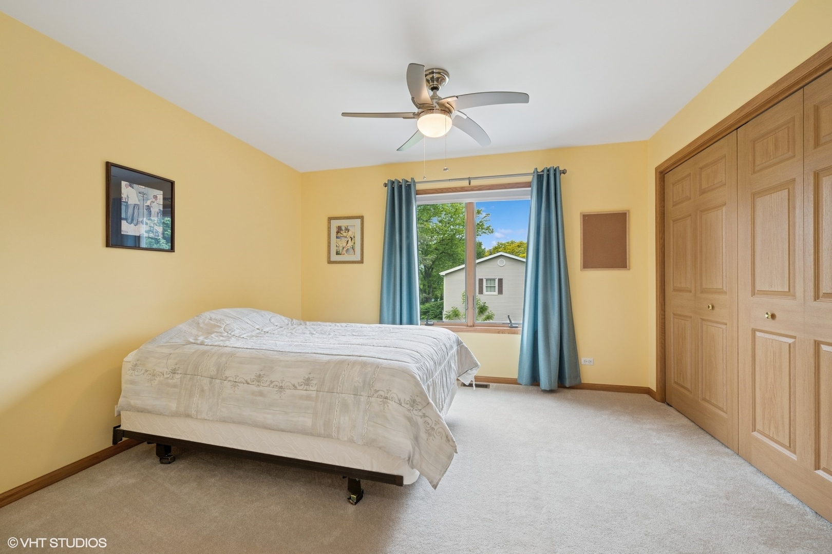 810 Tamarac Drive Algonquin, IL 60102 - Photo 19 of 36 a bedroom with a bed and a chandelier