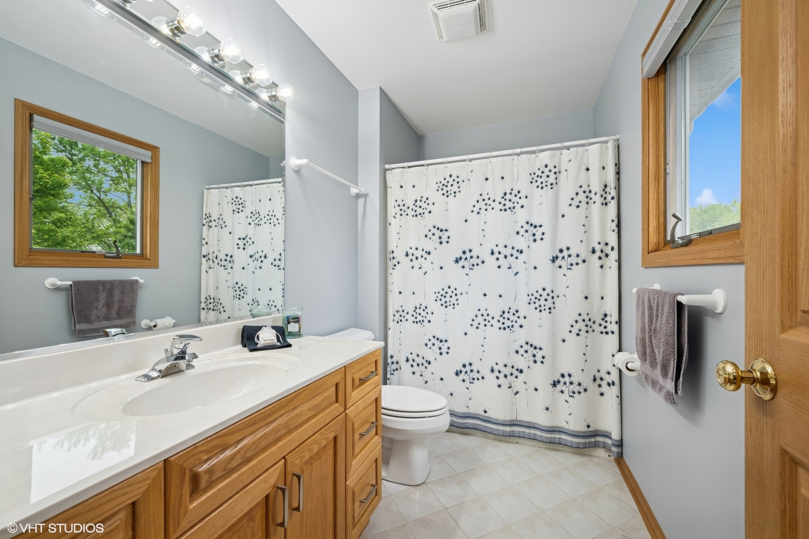 810 Tamarac Drive Algonquin, IL 60102 - Photo 20 of 36 a bathroom with a sink toilet double vanity and shower