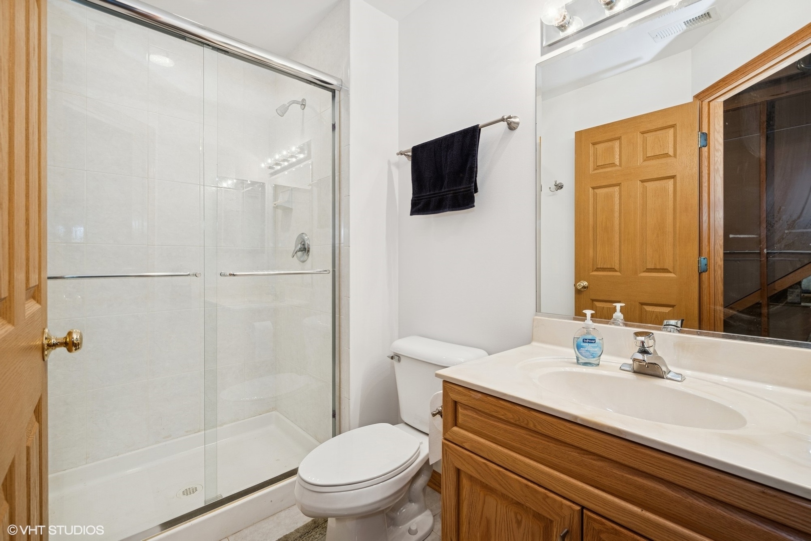 810 Tamarac Drive Algonquin, IL 60102 - Photo 27 of 36 a bathroom with a sink a toilet and shower