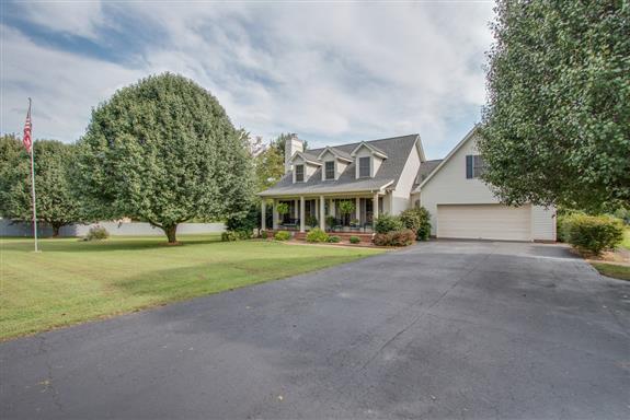 387 North Centerpoint Road Portland, TN 37148 - Photo 3 of 27 a view of a house with a yard and sitting area
