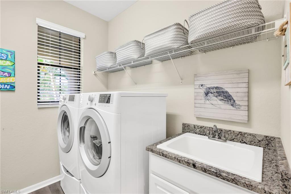 1526 Marton Court Naples, FL 34113 - Photo 21 of 44 laundry room with tub and dual load washer