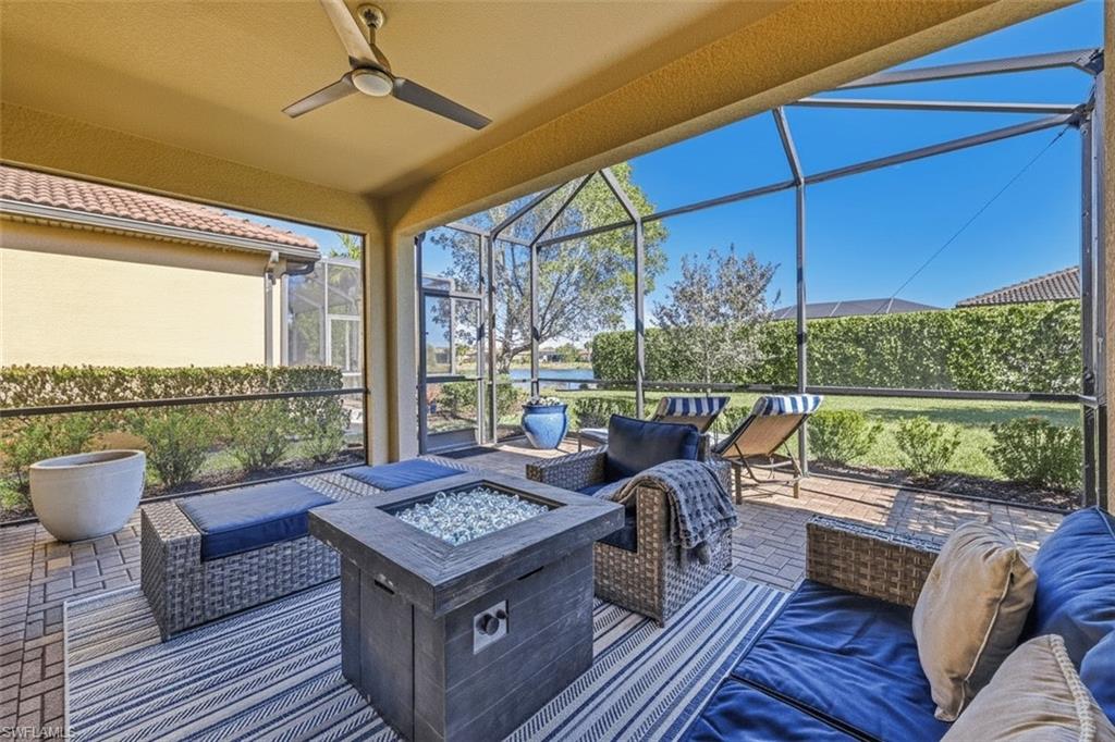 1526 Marton Court Naples, FL 34113 - Photo 22 of 44 extended, spacious lanai with partial pond view