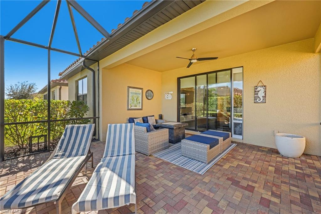 1526 Marton Court Naples, FL 34113 - Photo 23 of 44 doggie door with invisible fence