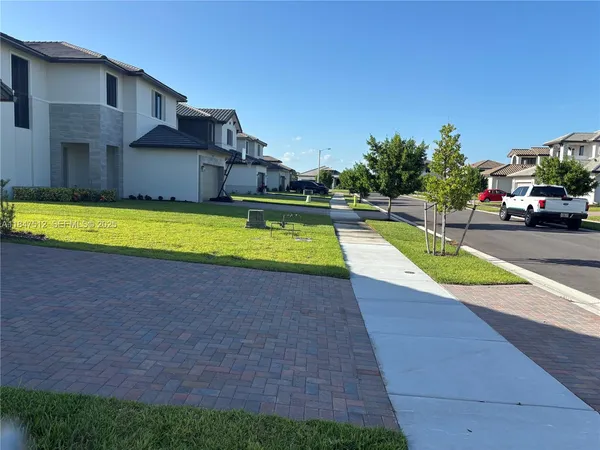 a view of a house with a swimming pool