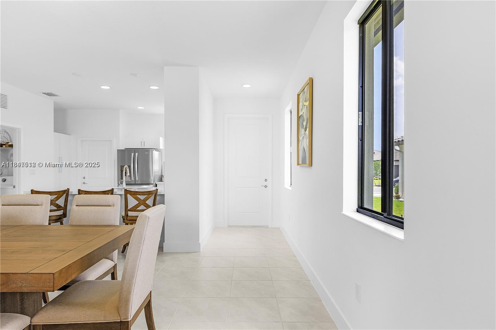 5061 Panella Avenue Immokalee, FL 34142 - Photo 10 of 13 a dining room with furniture and window