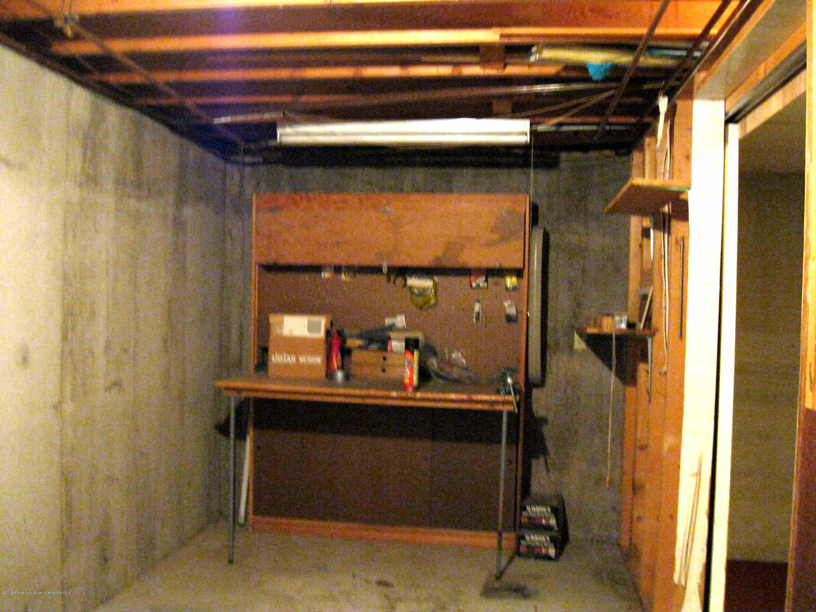 506 County Road 294 Rifle, CO 81650 - Photo 20 of 23 a room with water heater and a window