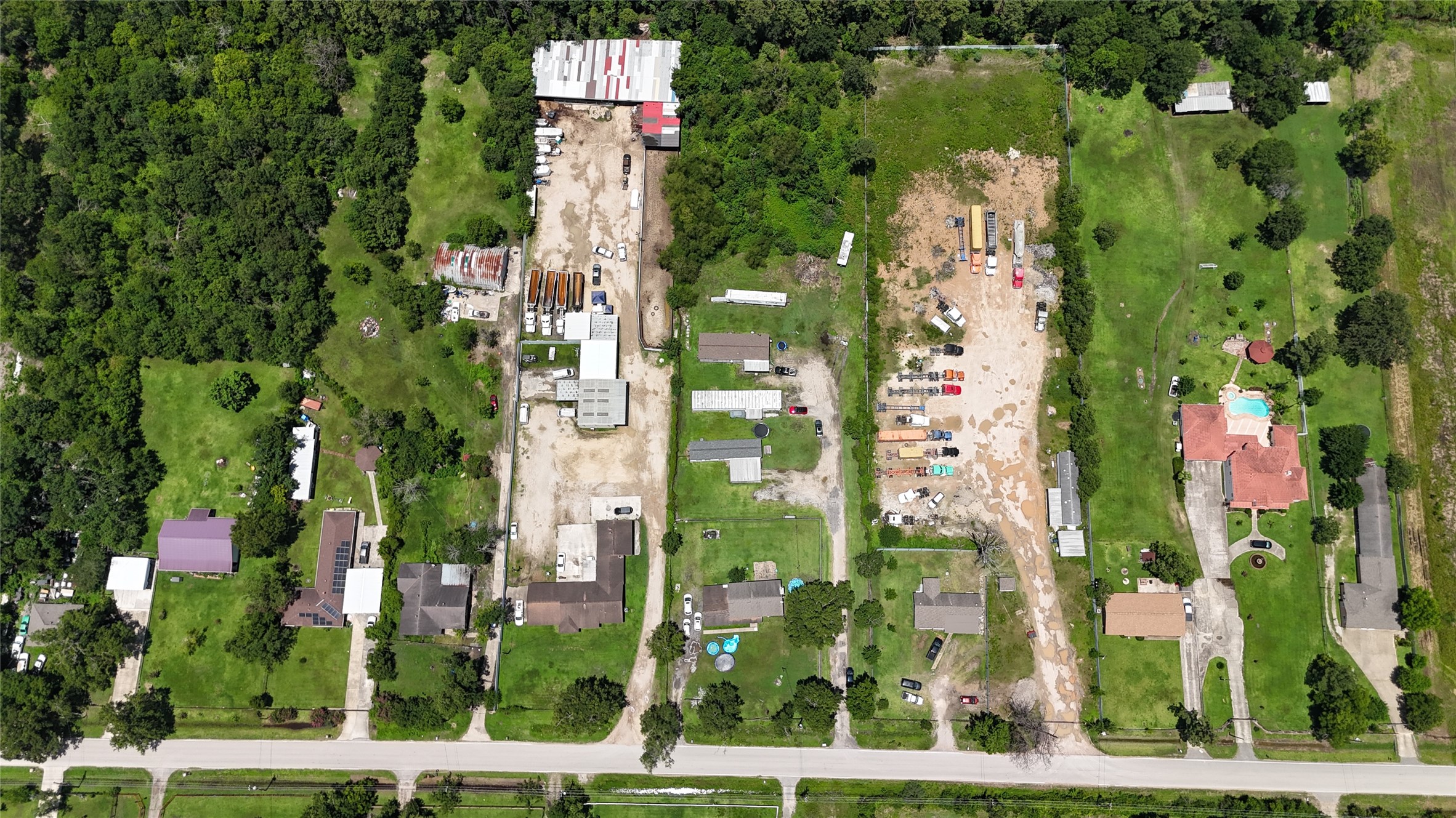 12033 Ticonderoga Road Houston, TX 77044 - Photo 6 of 9 an aerial view of residential houses with outdoor space and street view