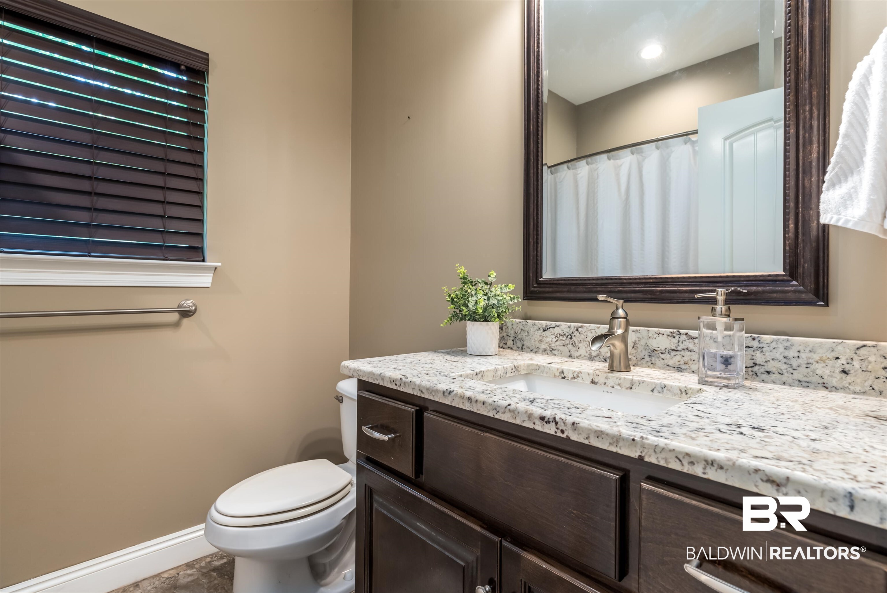 965 Henckley Avenue Mobile, AL 36609 - Photo 19 of 30 Bathroom featuring toilet and vanity