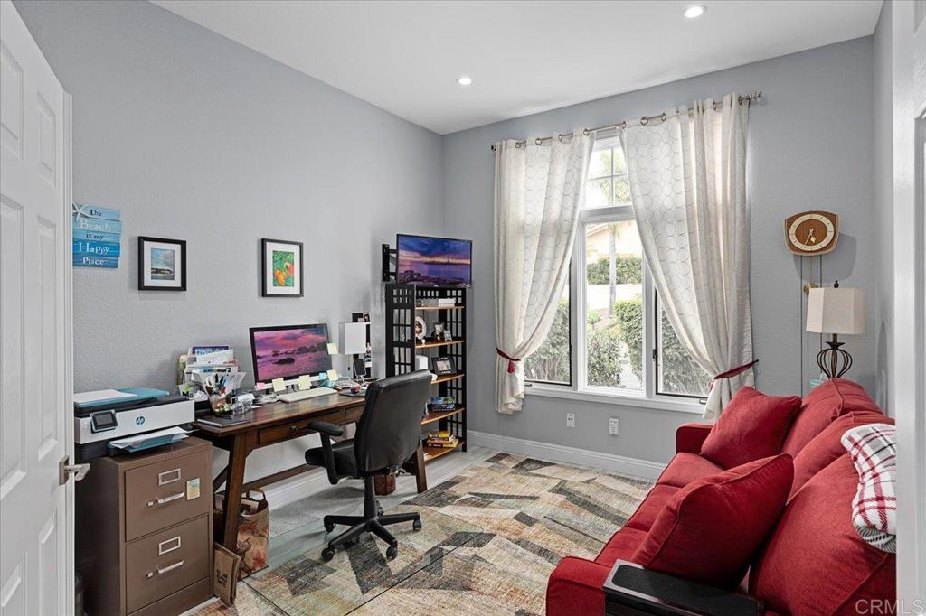 1838 Samoa Way Oceanside, CA 92054 - Photo 11 of 49 a view of a livingroom with workspace and a window