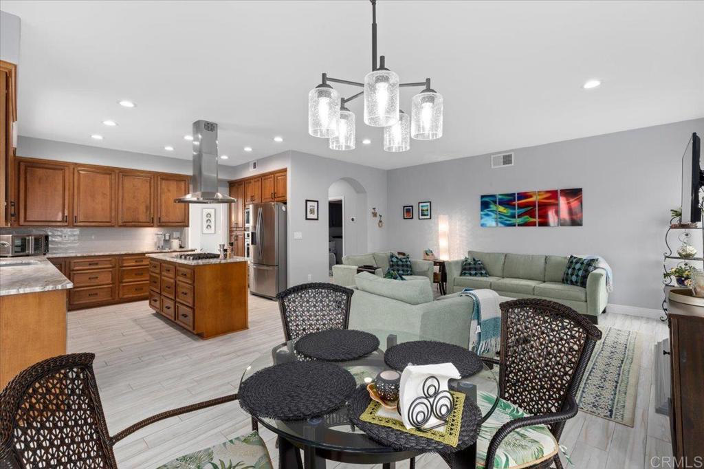 1838 Samoa Way Oceanside, CA 92054 - Photo 16 of 49 a view of a dining room with furniture