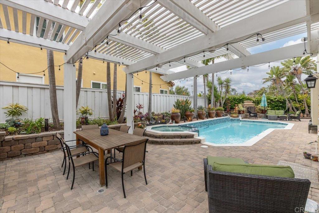 1838 Samoa Way Oceanside, CA 92054 - Photo 37 of 49 a view of swimming pool with outdoor seating and plants