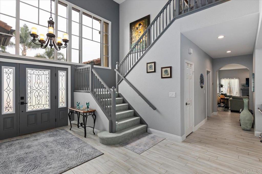 1838 Samoa Way Oceanside, CA 92054 - Photo 6 of 49 a view of entryway and hall with wooden floor