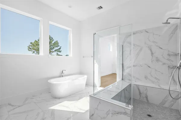 a bathroom with a sink and bathtub