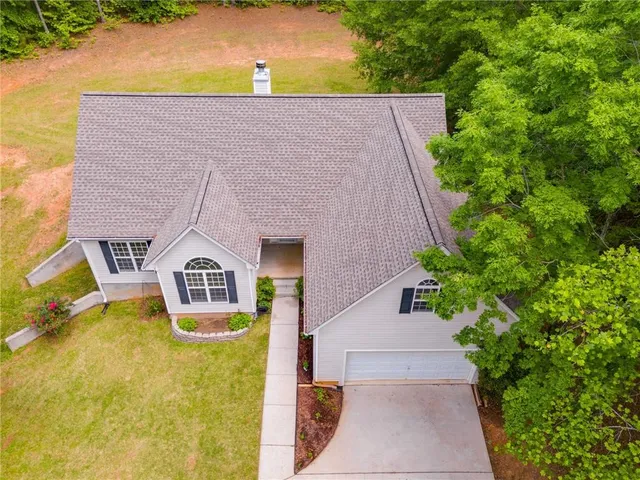 a view of house with outdoor space