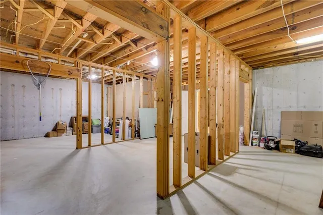a view of a room with wooden walls