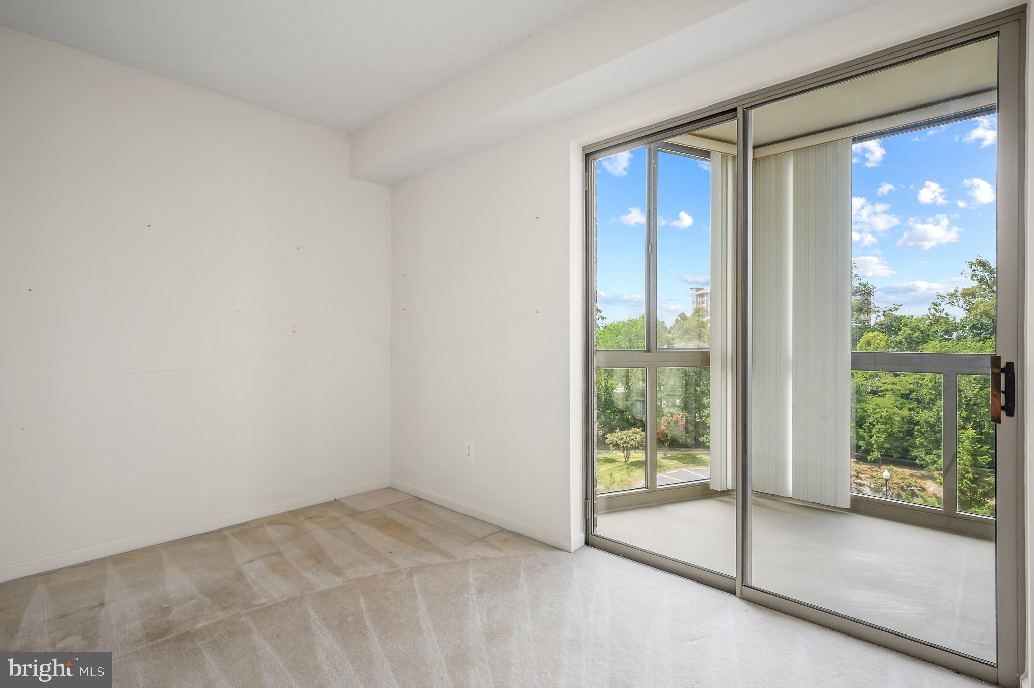 19365 Cypress Ridge Terrace, Unit 519 Leesburg, VA 20176 - Photo 13 of 24 a view of an empty room and window