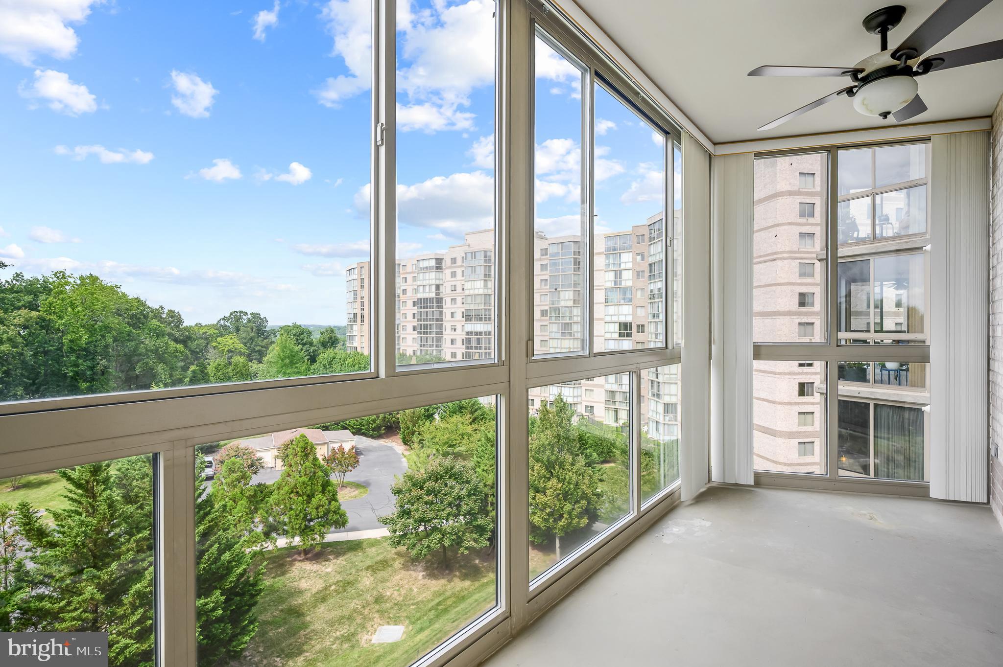 19365 Cypress Ridge Terrace, Unit 519 Leesburg, VA 20176 - Photo 5 of 24 a view of a city from a balcony