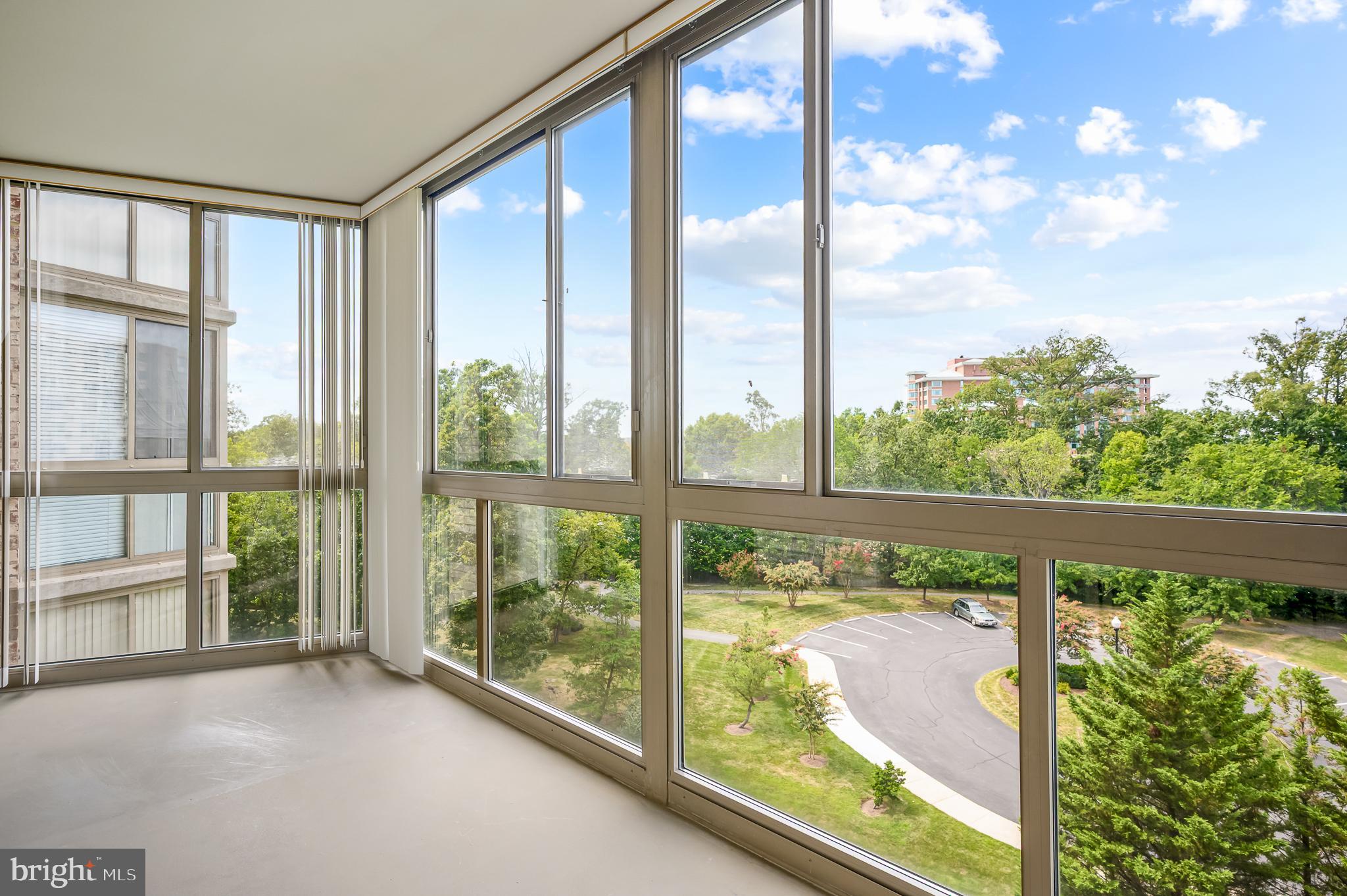 19365 Cypress Ridge Terrace, Unit 519 Leesburg, VA 20176 - Photo 6 of 24 a view of a city from a balcony