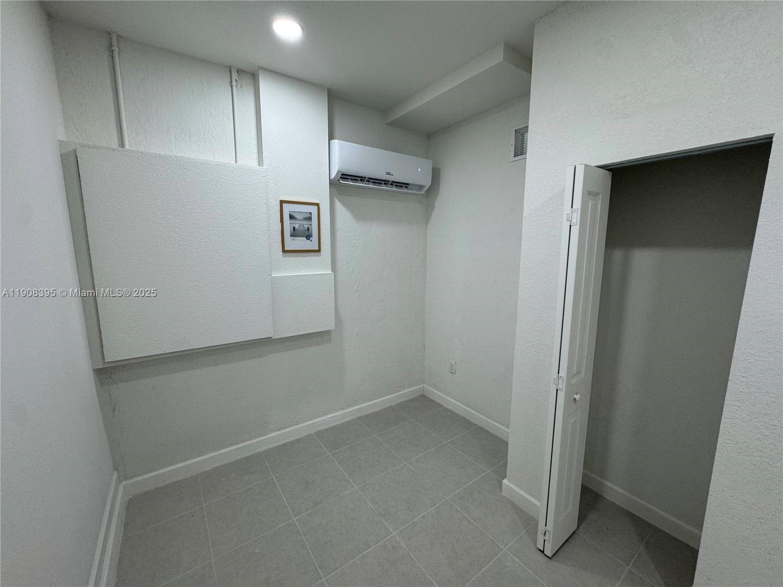 28850 Southwest 163rd Avenue, Unit 1 Homestead, FL 33033 - Photo 4 of 14 a view of an empty room